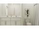 Bathroom with double vanity, toilet and shower at 15154 Rainbow Quartz St, Wimauma, FL 33598