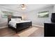 Large bedroom with king-size bed and ceiling fan at 1571 Jeffords St, Clearwater, FL 33756
