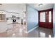 Modern kitchen featuring white cabinets, stainless steel appliances, and granite countertops at 1571 Jeffords St, Clearwater, FL 33756