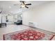 Open living area with tile floors and a large area rug at 1571 Jeffords St, Clearwater, FL 33756