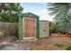 Two storage sheds in the backyard provide extra storage space at 1611 San Charles Dr, Dunedin, FL 34698