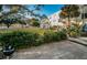 Cozy back patio with a grill and garden area, perfect for relaxing outdoors at 2258 World Parkway W Blvd # 8, Clearwater, FL 33763