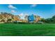 Well-manicured green space with a large decorative globe in the center at 2258 World Parkway W Blvd # 8, Clearwater, FL 33763