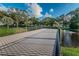 Scenic community dock overlooking the water with metal railing at 2258 World Parkway W Blvd # 8, Clearwater, FL 33763