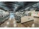 Community gym featuring modern cardio equipment, ceiling fans, and durable wood-look flooring at 2258 World Parkway W Blvd # 8, Clearwater, FL 33763