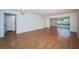 Bright living room with hardwood floors and lots of natural light at 2258 World Parkway W Blvd # 8, Clearwater, FL 33763