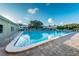 Enjoy the sparkling blue pool, inviting you to relax and soak up the sun at 2258 World Parkway W Blvd # 8, Clearwater, FL 33763