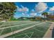 Community shuffleboard courts with lush green surroundings offer a place for recreation and relaxation at 2258 World Parkway W Blvd # 8, Clearwater, FL 33763