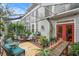 Screened patio with seating area and large plants at 2837 Bayshore Trails Dr, Tampa, FL 33611