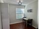 Bright breakfast nook features wood floors and window coverings at 3053 Overlook Pl, Clearwater, FL 33760