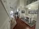 Spacious dining area with hardwood floors and access to living room at 3053 Overlook Pl, Clearwater, FL 33760