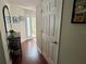 Light and airy entryway with wood floors and a view to backyard at 3053 Overlook Pl, Clearwater, FL 33760