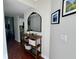 Bright entryway with mirror and storage at 3053 Overlook Pl, Clearwater, FL 33760