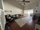 Spacious living room with hardwood floors and access to a patio at 3053 Overlook Pl, Clearwater, FL 33760