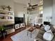 Open living room with fireplace, lofted ceiling and hardwood floors at 3053 Overlook Pl, Clearwater, FL 33760