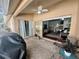 Private patio with sliding door access from the living room at 3053 Overlook Pl, Clearwater, FL 33760