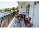 Balcony with table and chairs, offering water views at 3753 46Th S Ave # 7, St Petersburg, FL 33711