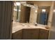 Bathroom with corner vanity and mirrored medicine cabinet at 3753 46Th S Ave # 7, St Petersburg, FL 33711