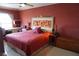 Spacious bedroom with a large bed and built-in desk at 3753 46Th S Ave # 7, St Petersburg, FL 33711