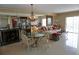 Elegant dining area with a round table and chandelier at 3753 46Th S Ave # 7, St Petersburg, FL 33711