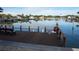 Community dock with seating, offering scenic views at 3753 46Th S Ave # 7, St Petersburg, FL 33711
