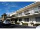 Two-story building exterior with parking and landscaping at 3753 46Th S Ave # 7, St Petersburg, FL 33711