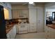 Functional kitchen with white cabinets and appliances at 3753 46Th S Ave # 7, St Petersburg, FL 33711
