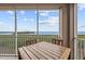 Relax on this screened balcony with water views at 380 Aruba Cir # 203, Bradenton, FL 34209