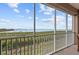 Enjoy breathtaking water views from this screened balcony at 380 Aruba Cir # 203, Bradenton, FL 34209