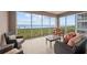 Spacious screened balcony offering stunning water views at 380 Aruba Cir # 203, Bradenton, FL 34209