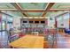 Community bar with seating and large screen TVs at 380 Aruba Cir # 203, Bradenton, FL 34209