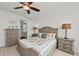 Guest bedroom with king-size bed and dresser at 380 Aruba Cir # 203, Bradenton, FL 34209