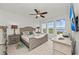 Main bedroom with water views and comfortable furnishings at 380 Aruba Cir # 203, Bradenton, FL 34209
