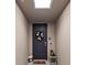 Inviting entryway with a charming wreath and unique decor at 380 Aruba Cir # 203, Bradenton, FL 34209