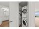 Stackable washer and dryer in a convenient laundry closet at 380 Aruba Cir # 203, Bradenton, FL 34209