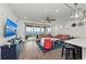Bright living room with water views, comfy sofas, and hardwood floors at 380 Aruba Cir # 203, Bradenton, FL 34209