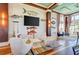 Lounge area with white seating and nautical decor at 380 Aruba Cir # 203, Bradenton, FL 34209