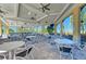 Outdoor patio with tables, chairs, and scenic views at 380 Aruba Cir # 203, Bradenton, FL 34209