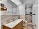 Bathroom with marble vanity and walk-in shower at 4250 37Th S St # 5, St Petersburg, FL 33711