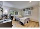 Bright bedroom featuring a comfortable bed and a workspace at 4250 37Th S St # 5, St Petersburg, FL 33711