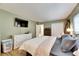 Main bedroom with king bed and lots of natural light at 4250 37Th S St # 5, St Petersburg, FL 33711