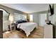 Main bedroom with king bed and en-suite bathroom at 4250 37Th S St # 5, St Petersburg, FL 33711