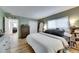 Main bedroom with king-size bed and built-in dresser at 4250 37Th S St # 5, St Petersburg, FL 33711