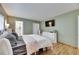 Main bedroom with king bed and en-suite bathroom at 4250 37Th S St # 5, St Petersburg, FL 33711