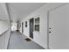 Interior hallway with doors to individual units at 4250 37Th S St # 5, St Petersburg, FL 33711
