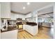 Modern white kitchen with stainless steel appliances and granite countertops at 4250 37Th S St # 5, St Petersburg, FL 33711