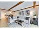 Open living room with sectional sofa and kitchen view at 4250 37Th S St # 5, St Petersburg, FL 33711