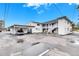 Rear view of building with parking and additional building in background at 4250 37Th S St # 5, St Petersburg, FL 33711