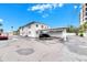 Rear view of building showcasing carport parking spaces at 4250 37Th S St # 5, St Petersburg, FL 33711