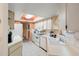 Efficient kitchen with white appliances and a skylight at 4345 Union Springs Rd, Spring Hill, FL 34608